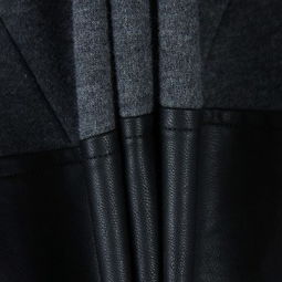 時尚與保暖的完美結(jié)合 茵曼2012冬裝皮革拼接立領(lǐng)連帽衛(wèi)衣外套解析